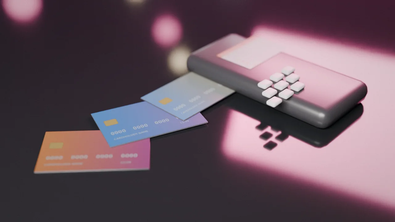 A simple illustration of a debit card and a smartphone showing a bank transfer beside a checkout screen icon.